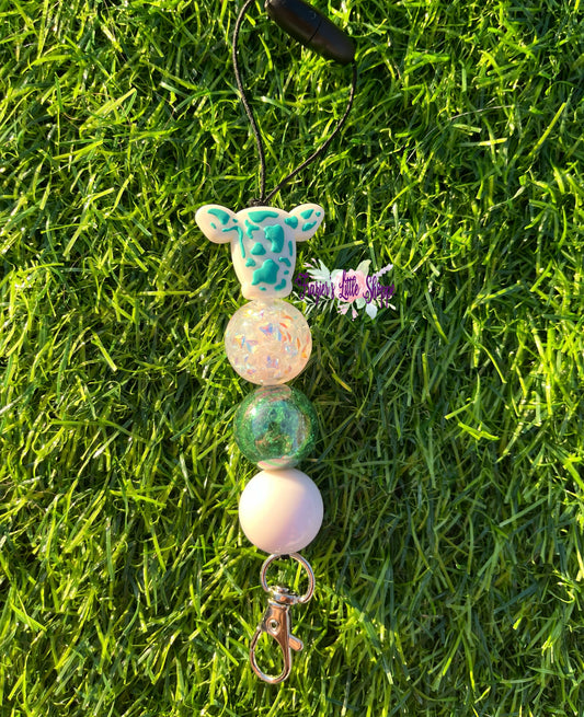 Turquoise spotted cow Freshie hanger