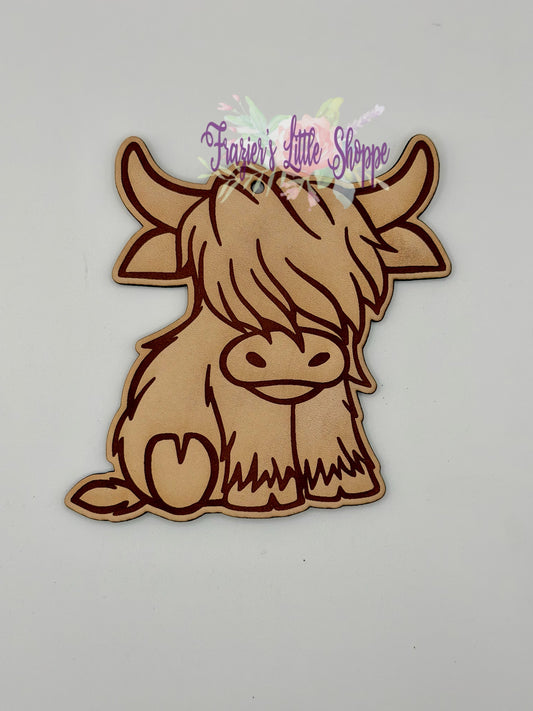 Side sitting highland cow leather freshie blank